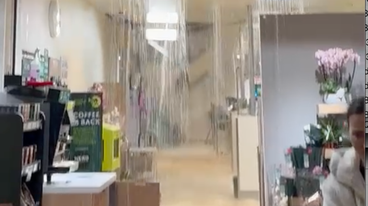 Rain crashes through the ceiling