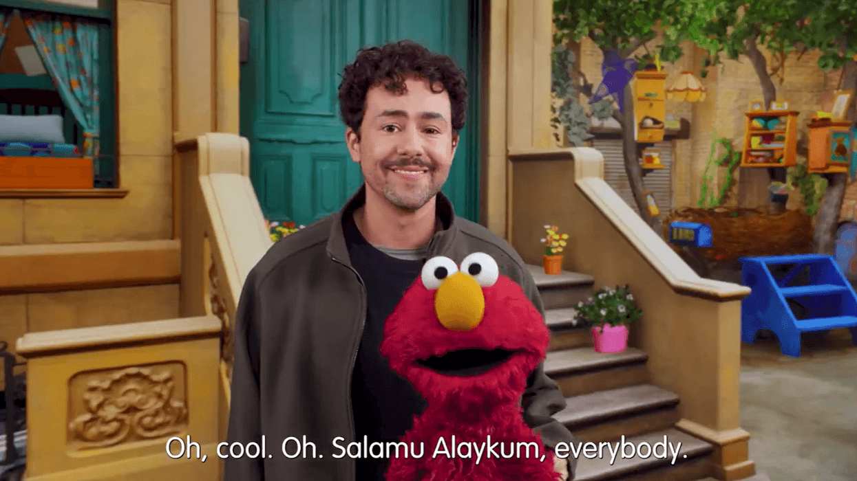Ramy Youssef and Elmo