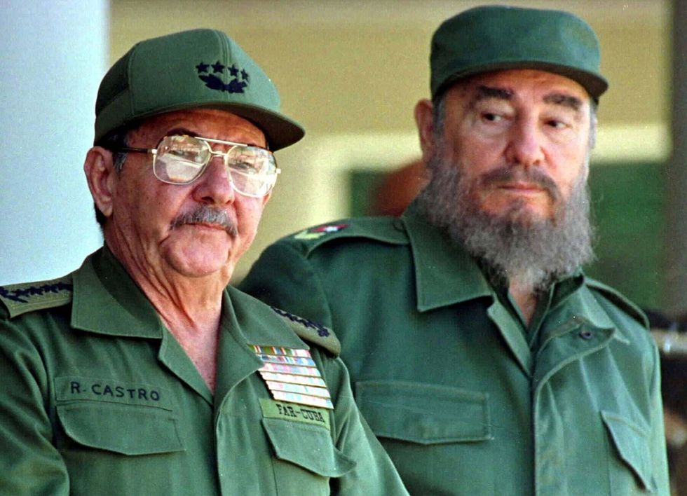 Raul Castro (left) alongside his brother Fidel