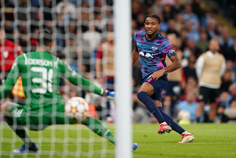RB Leipzig's Christopher Nkunku scores their side's third goal of the game competing a hat-trick during the UEFA Champions League, Group A match at the Etihad Stadium, Manchester.