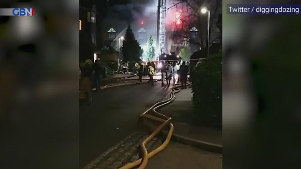 Reading fire: Witnesses report people throwing themselves from burning building