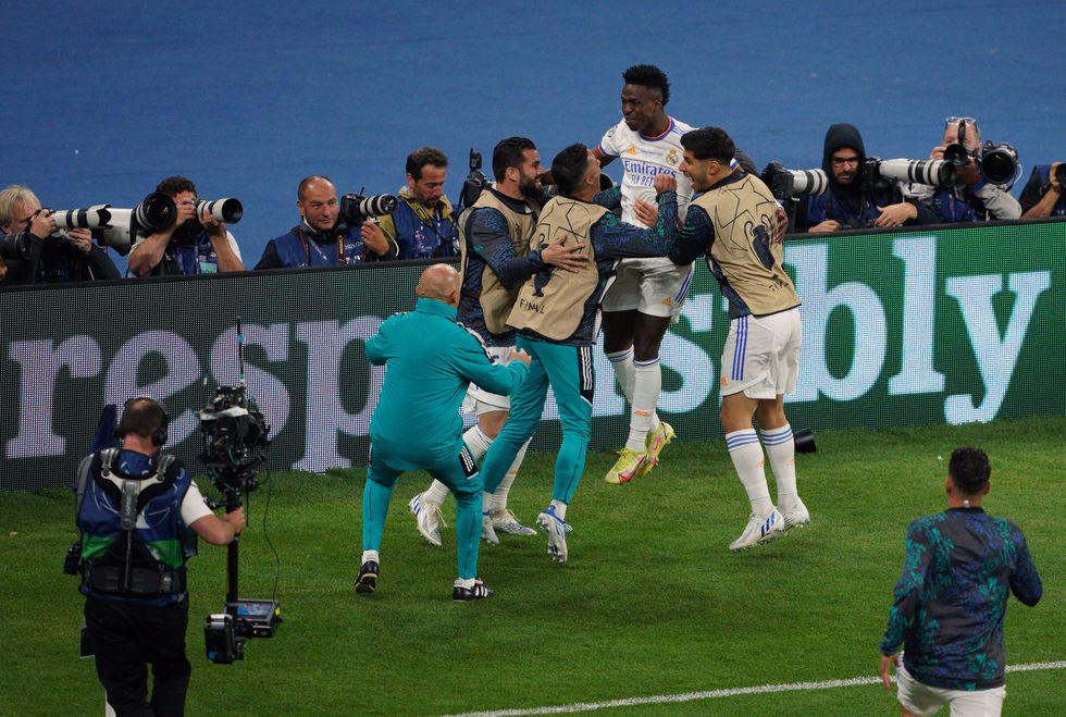 Real Madrid's Jose Vinicius Junior celebrates scoring the opening goal during the UEFA Champions League Final at the Stade de France, Paris. Picture date: Saturday May 28, 2022.