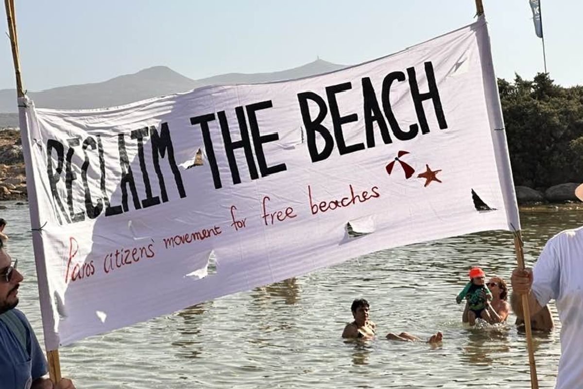 Reclaim the beach sign