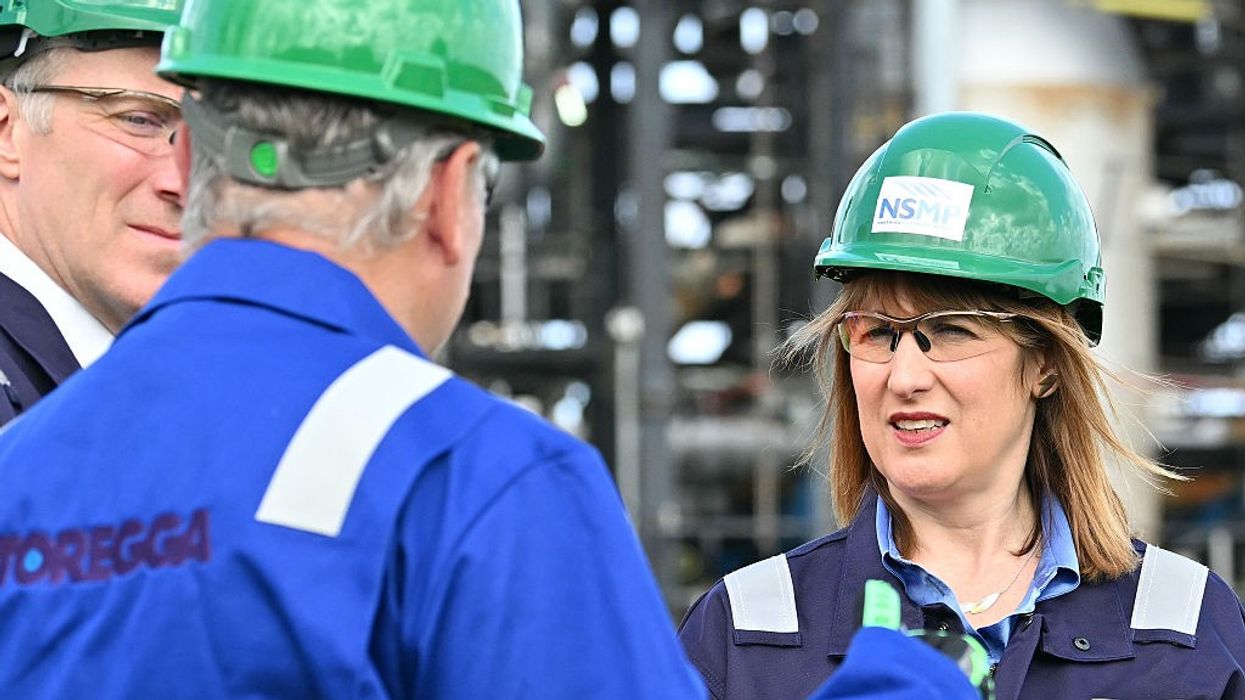 Reeves talking to workers