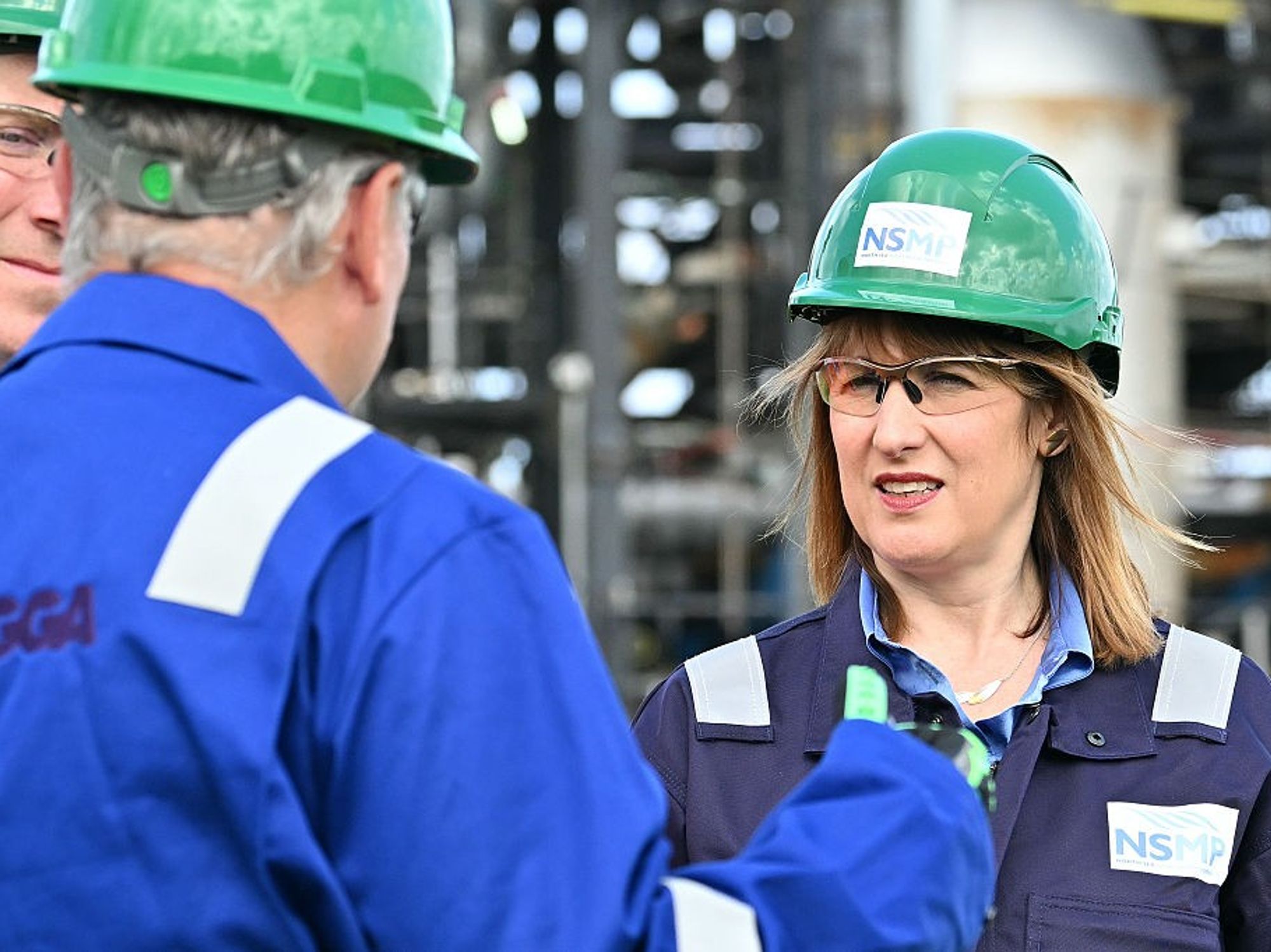 Reeves talking to workers