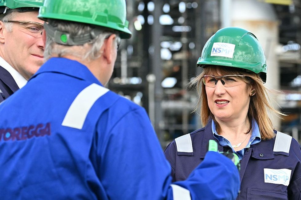 Reeves talking to workers