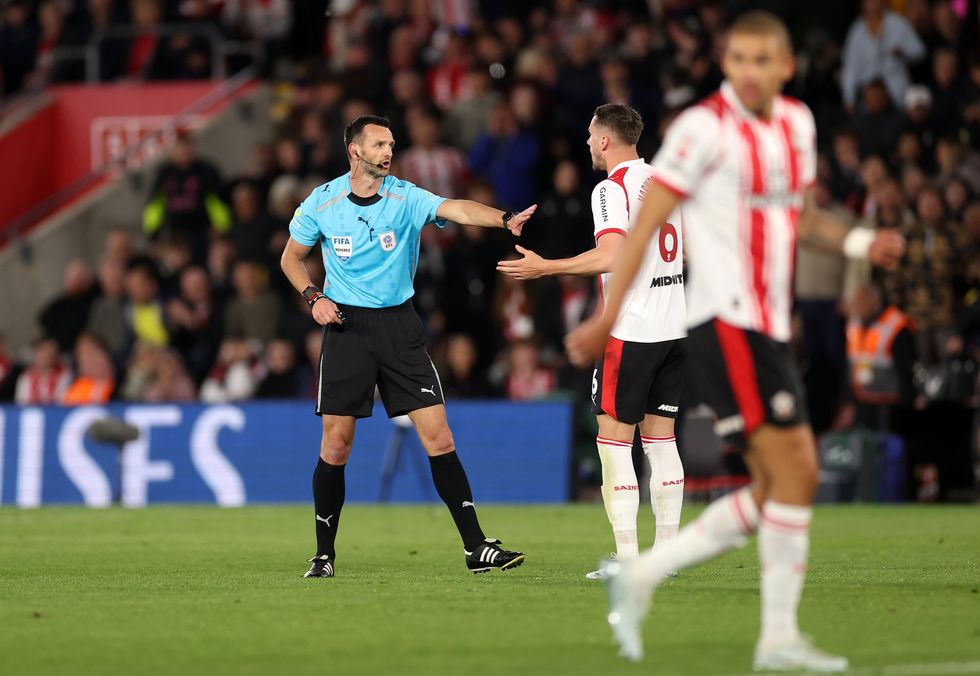 Referee Andy Madley halted the match after the comment was allegedly said