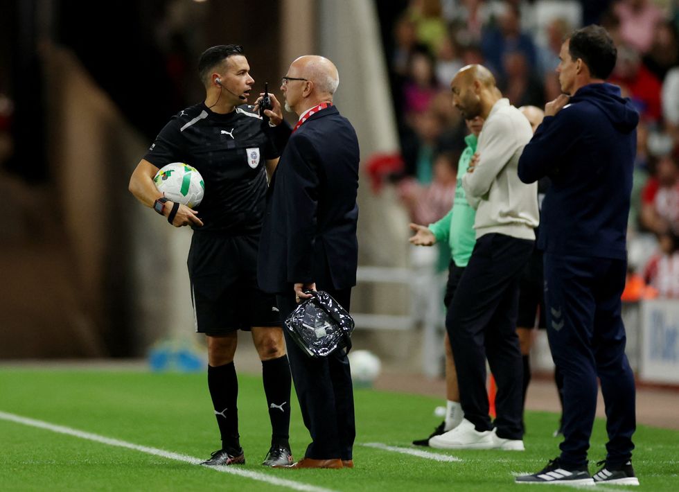 Referee Dean Whitestone called a halt to the match after a medical emergency in the crowd