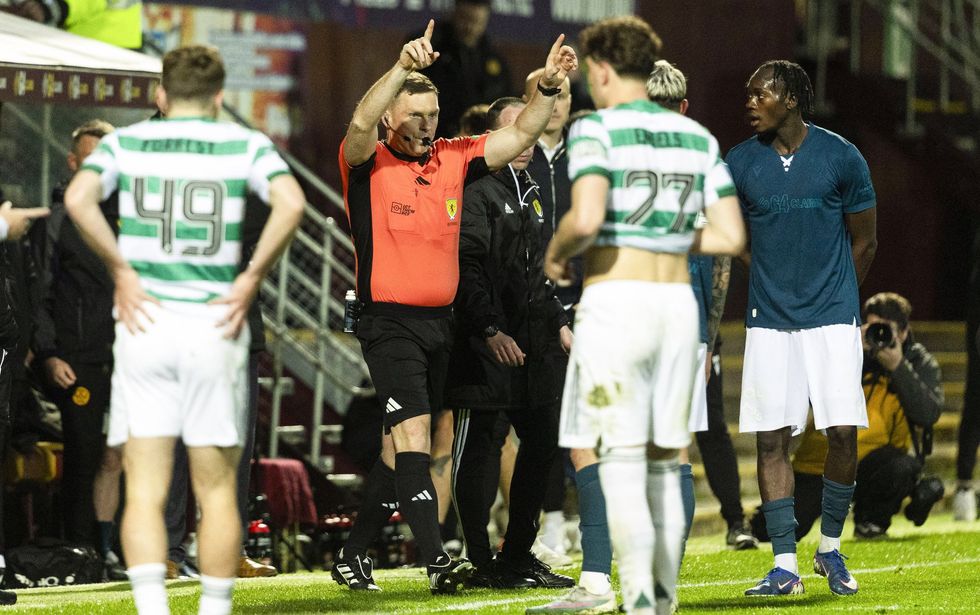 Referee John Beaton consulted the pitchside monitor before awarding Celtic the penalty