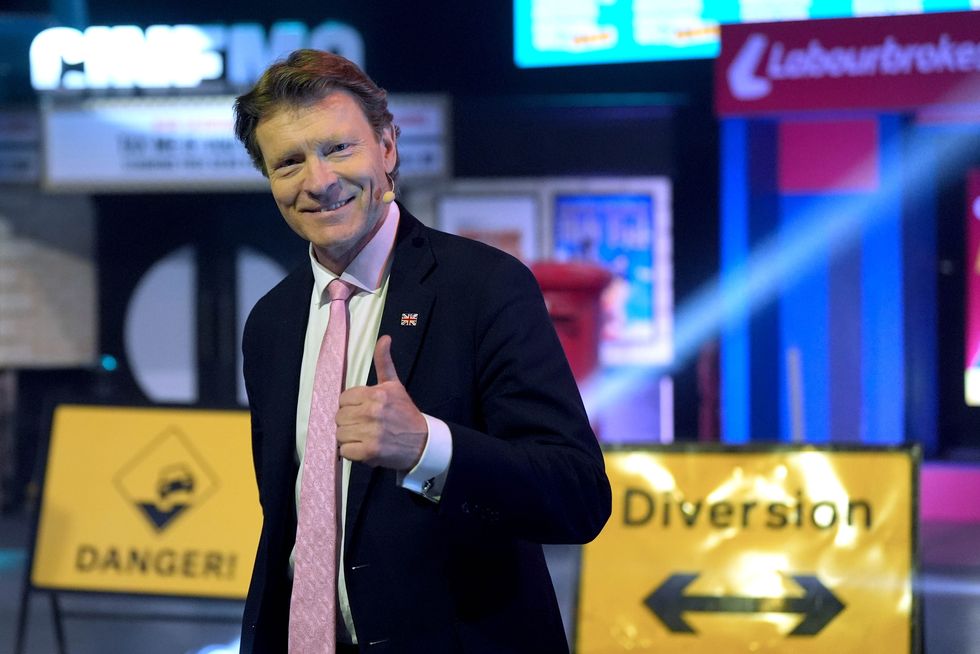 Reform UK deputy leader Richard Tice gestures as he walks to the stage to speak during the Reform UK local election launch rally at the Utilita Arena Birmingham