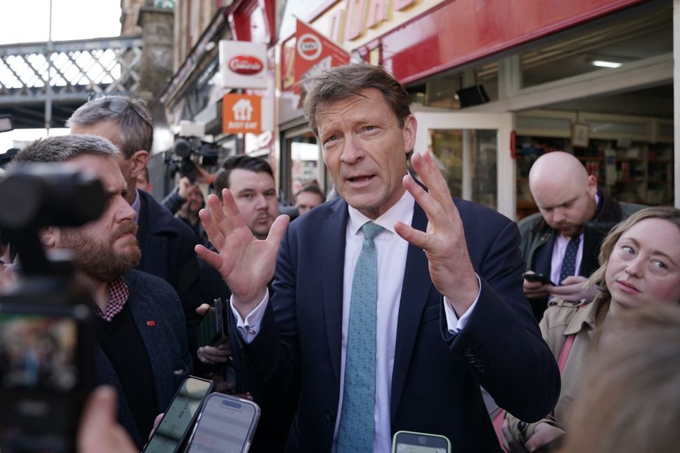 Reform UK deputy leader Richard Tice MP talking to members of the media during a visit to Vald'oro Chip shop in Glasgow.