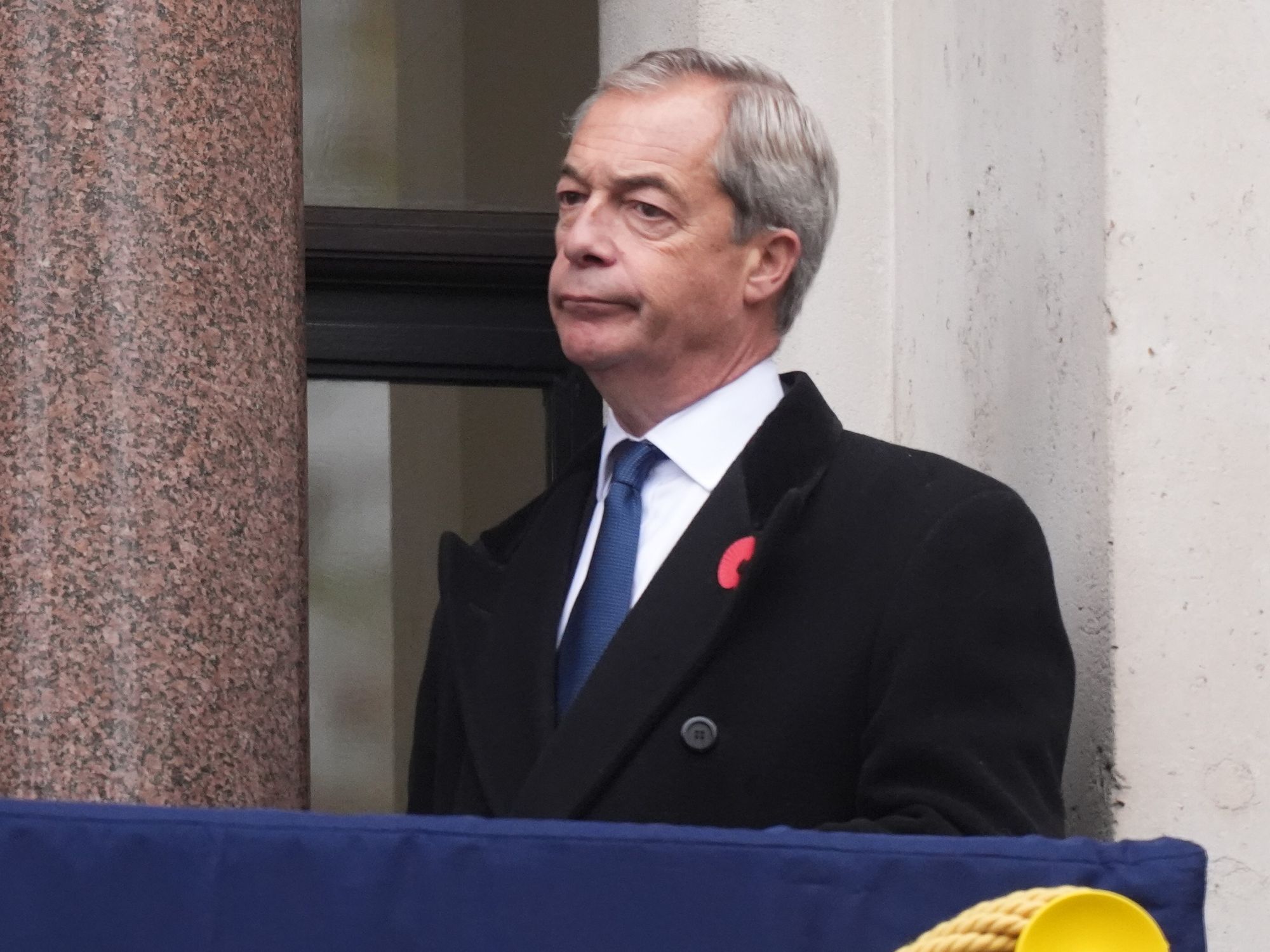 Reform UK leader Nigel Farage on a balcony at the Foreign, Commonwealth and Development Office (FCDO) ahead of the Remembrance Sunday service at the Cenotaph in London