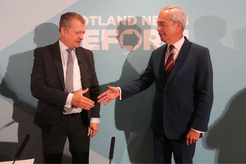 Reform UK party leader Nigel Farage (right) and MSP Graham Simpson at a press conference at Macdonald Houstoun House