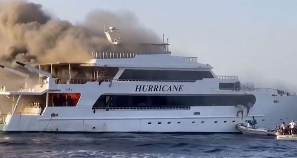 Remaining passengers jumped onto a dinghy manned by a rescue crew for safety.