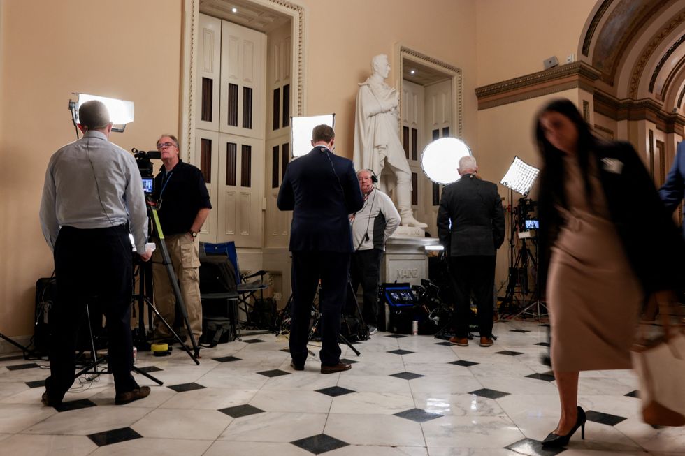 Reporters and members of Congress participate in live TV segments before the vote\u200b