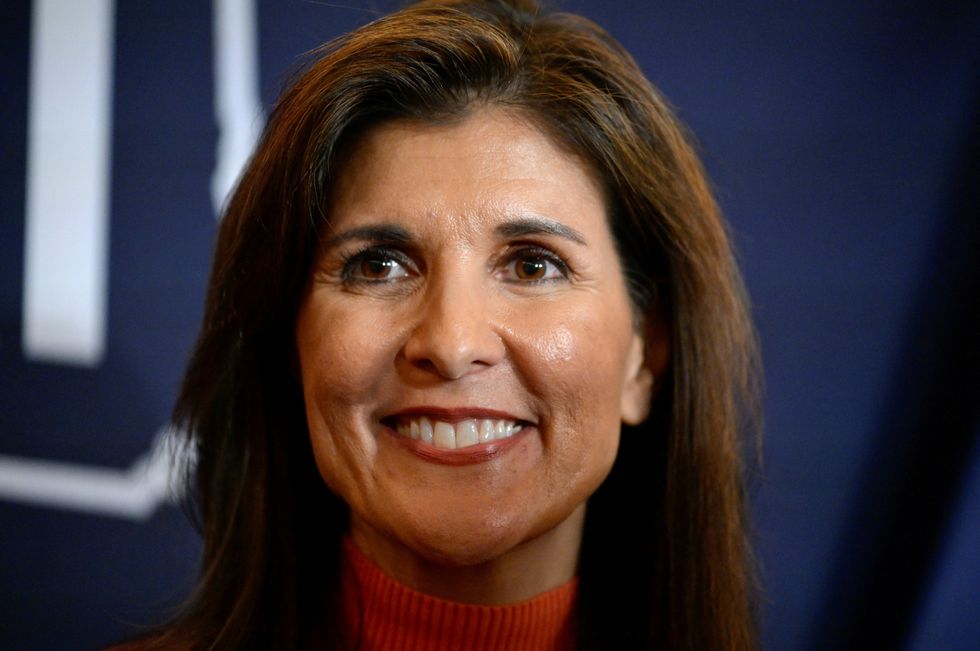 Republican presidential candidate and former U.S. Ambassador to the United Nations Nikki Haley smiles as she holds a rally at the Omni Mt. Washington Hotel & Resort in Bretton Woods