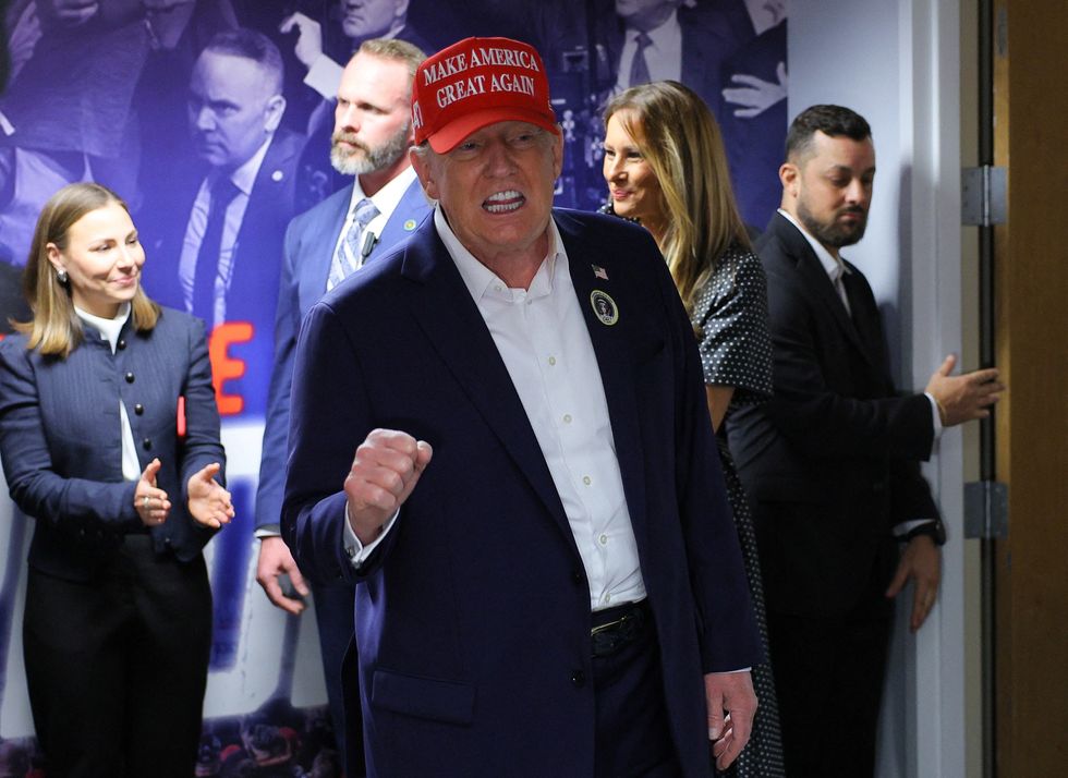 Republican presidential nominee and former U.S. President Donald Trump, accompanied by former U.S. first lady Melania Trump, visits his campaign headquarters\u200b