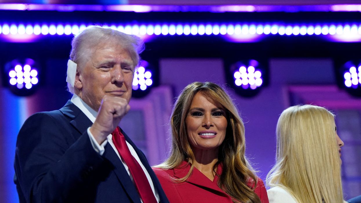 Republican presidential nominee and former US President Donald Trump is joined on stage by wife Melania