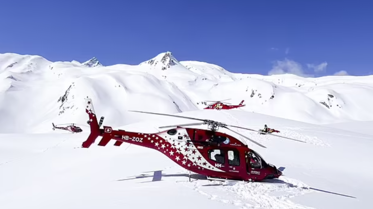 Rescue helicopters at the site after the crash