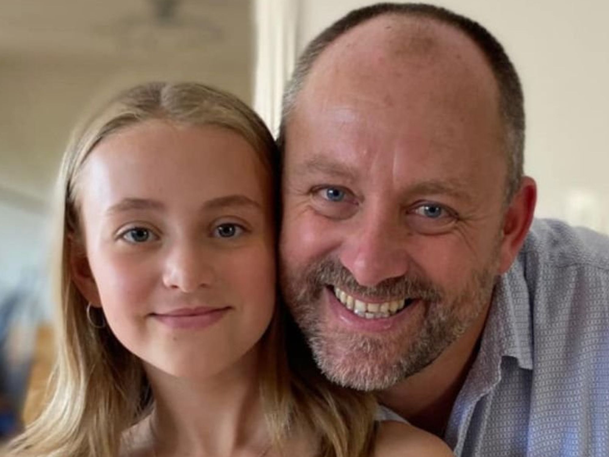 Rescuers on the mountain and Rob Mason with his daughter Kezia