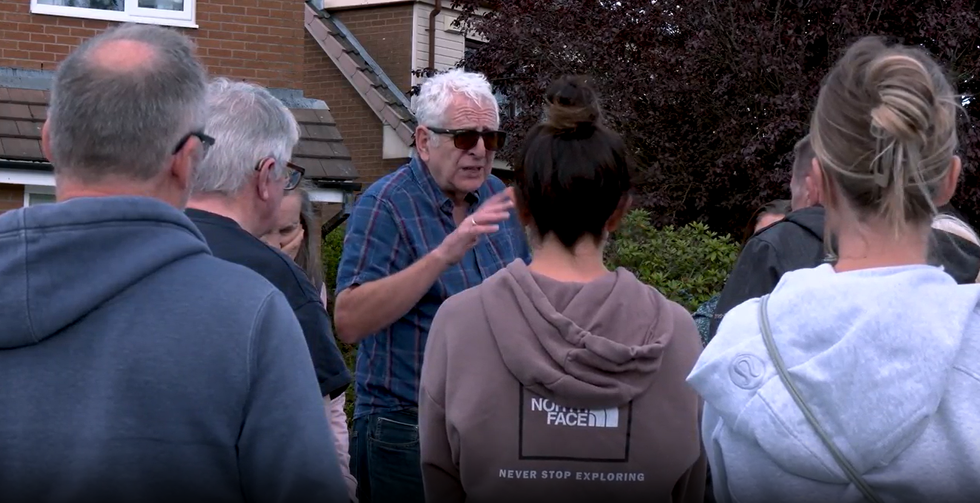 Residents discussing how to proceed