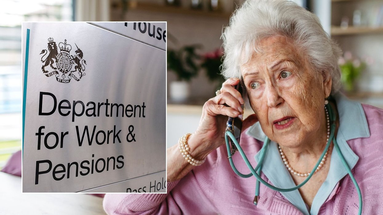 Retiree on the phone and DWP sign