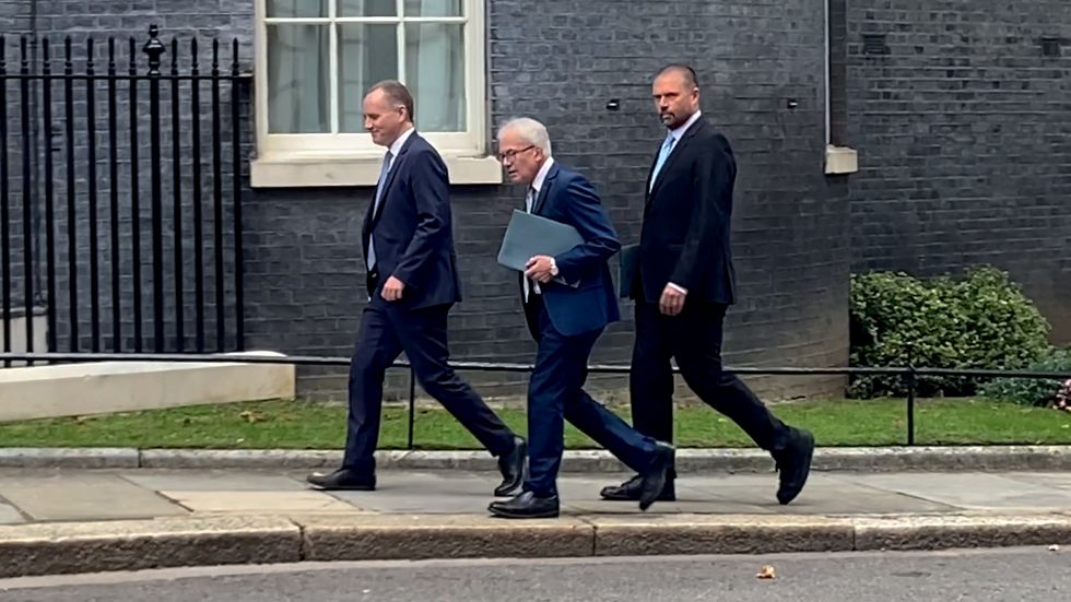 RETRANSMITTING ADDING NAMES Screen grab taken from PA Video of (left to right) Richard Hughes, Professor David Miles and Andy King from the Office of Budget Responsibility (OBR) arriving at 10 Downing Street, London, for a meeting with Prime Minister Liz Truss and Chancellor of the Exchequer Kwasi Kwarteng amid market turmoil following last week's mini-budget. Picture date: Friday September 30, 2022.