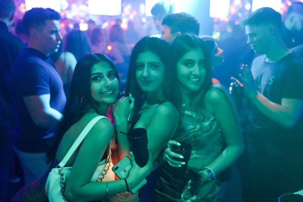 Revellers at Players Bar in Birmingham during New Year's Eve celebrations. Picture date: Friday December 31, 2021.