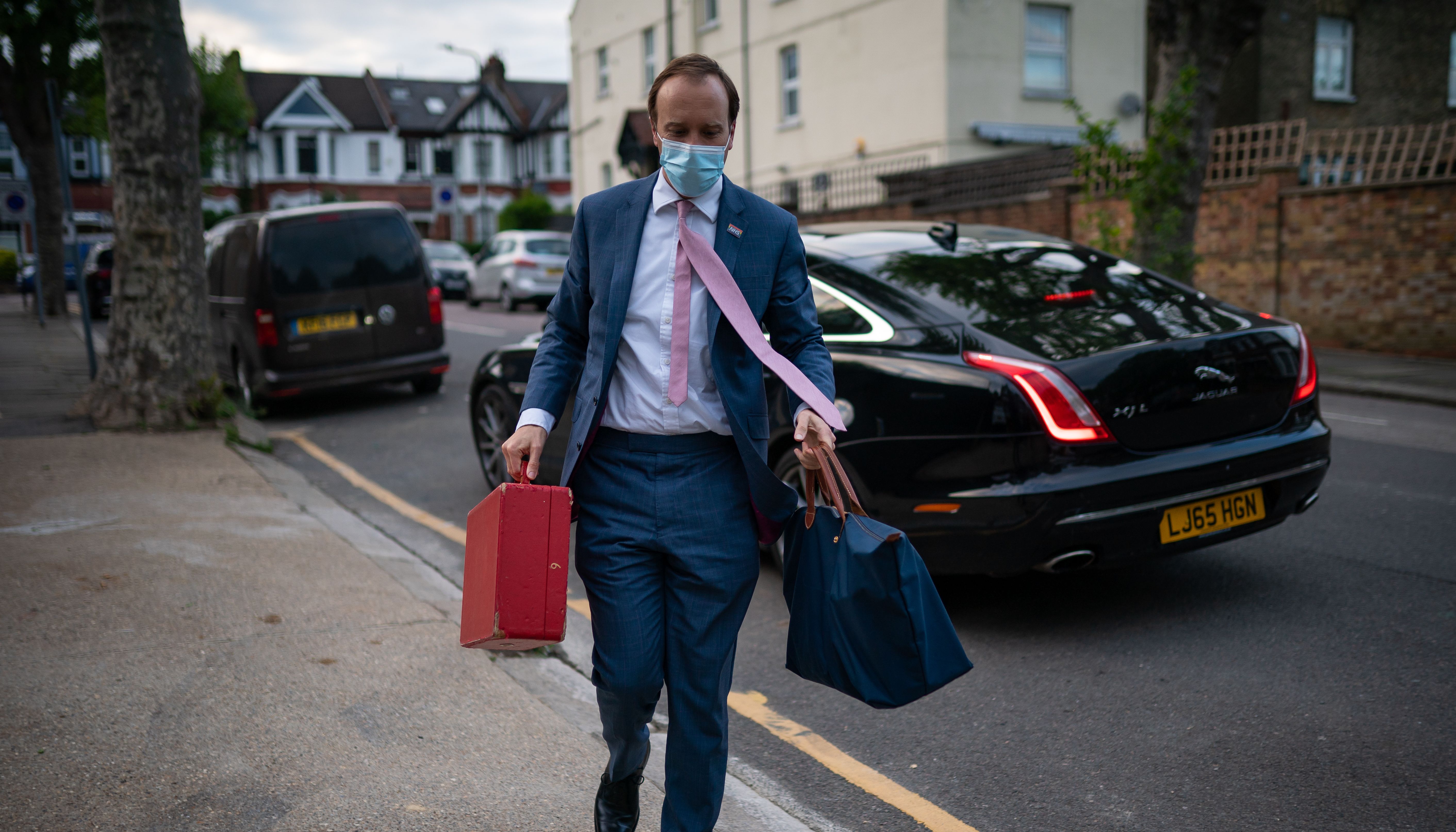 Review of the Year 2021. File photo dated 26/05/21 of the then Health Minister Matt Hancock outside his home in north west London. Dominic Cummings, former chief adviser to Prime Minister Boris Johnson, who gave evidence to the joint inquiry of the Commons Health and Social Care and Science and Technology Committees, said that Mr Hancock should have been fired over coronavirus failings and %22criminal, disgraceful behaviour%22 on the testing target. Issue date: Tuesday December 21, 2021.