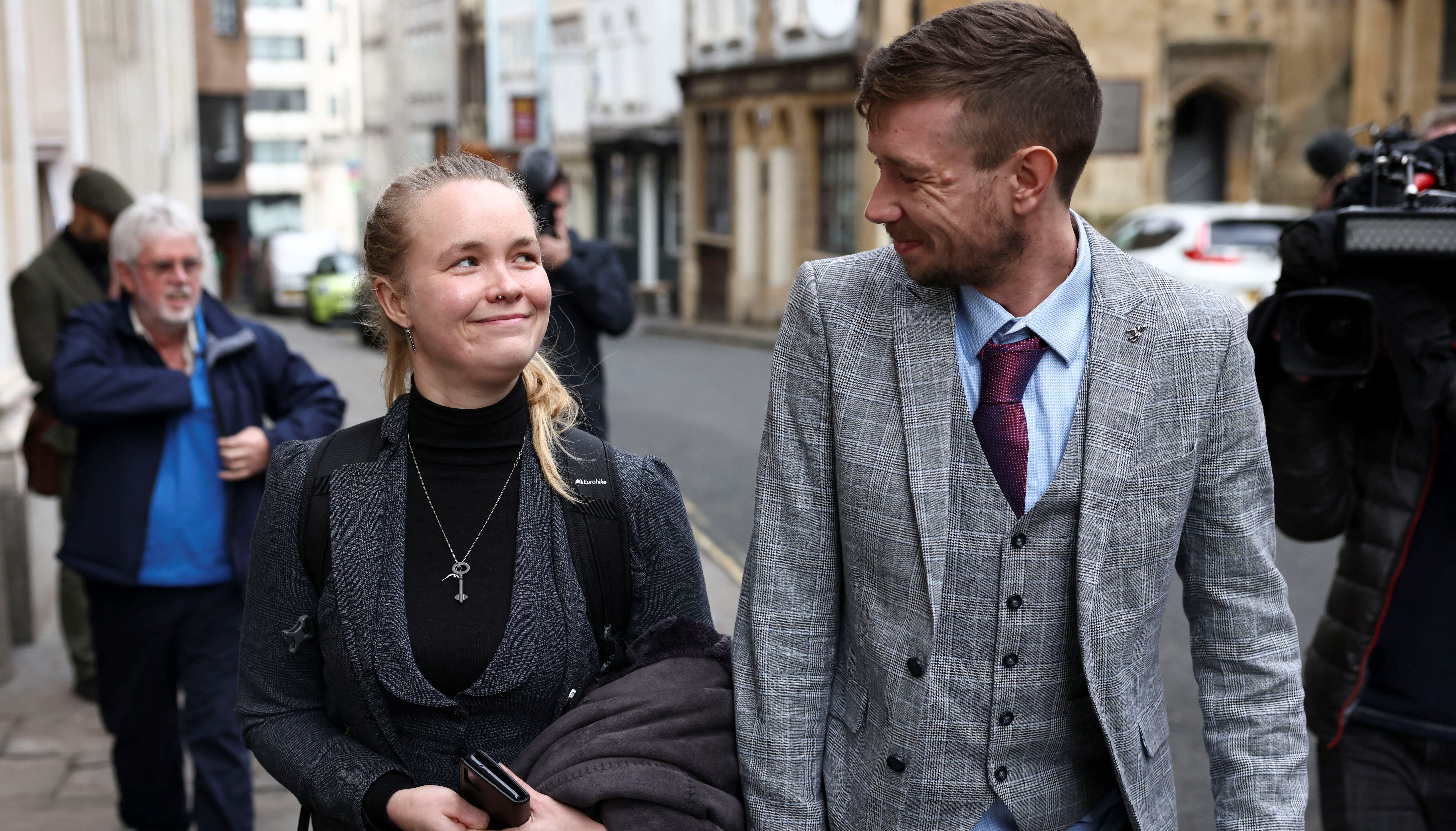 Rhian Graham and her boyfriend walk outside the Bristol Crown Court during a break in the %22Colston 4%22 trial after they have been charged with criminal damage over the toppling of an Edward Colston statue in Bristol