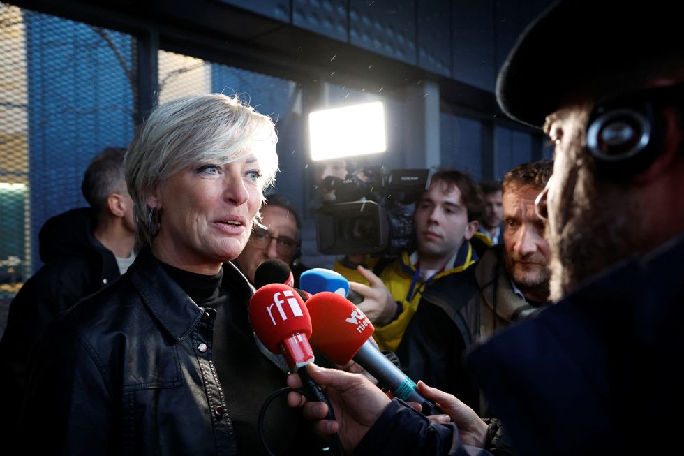 Ria van der Steen, relative of victims of the Malaysia Airlines flight MH-17 crash, speaks to media after the Dutch court announced its ruling in the MH17 trial of three Russians and a Ukrainian in the Schiphol Judicial Complex, Badhoevedorp, Netherlands, November 17, 2022. REUTERS/Piroschka van de Wouw