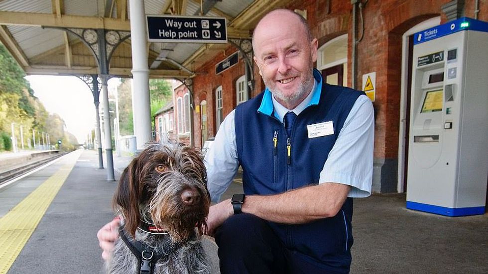 Richard Bunce and his dog George (left)