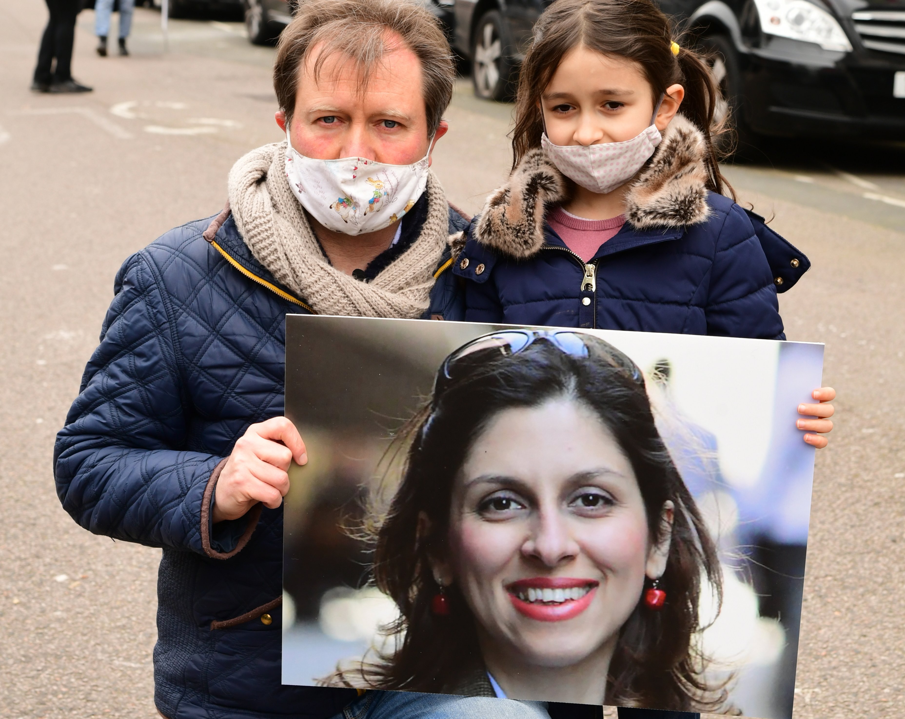 Richard Ratcliffe, the husband of Nazanin Zaghari-Ratcliffe, with his daughter Gabriella during a protest outside the Iranian Embassy in London.