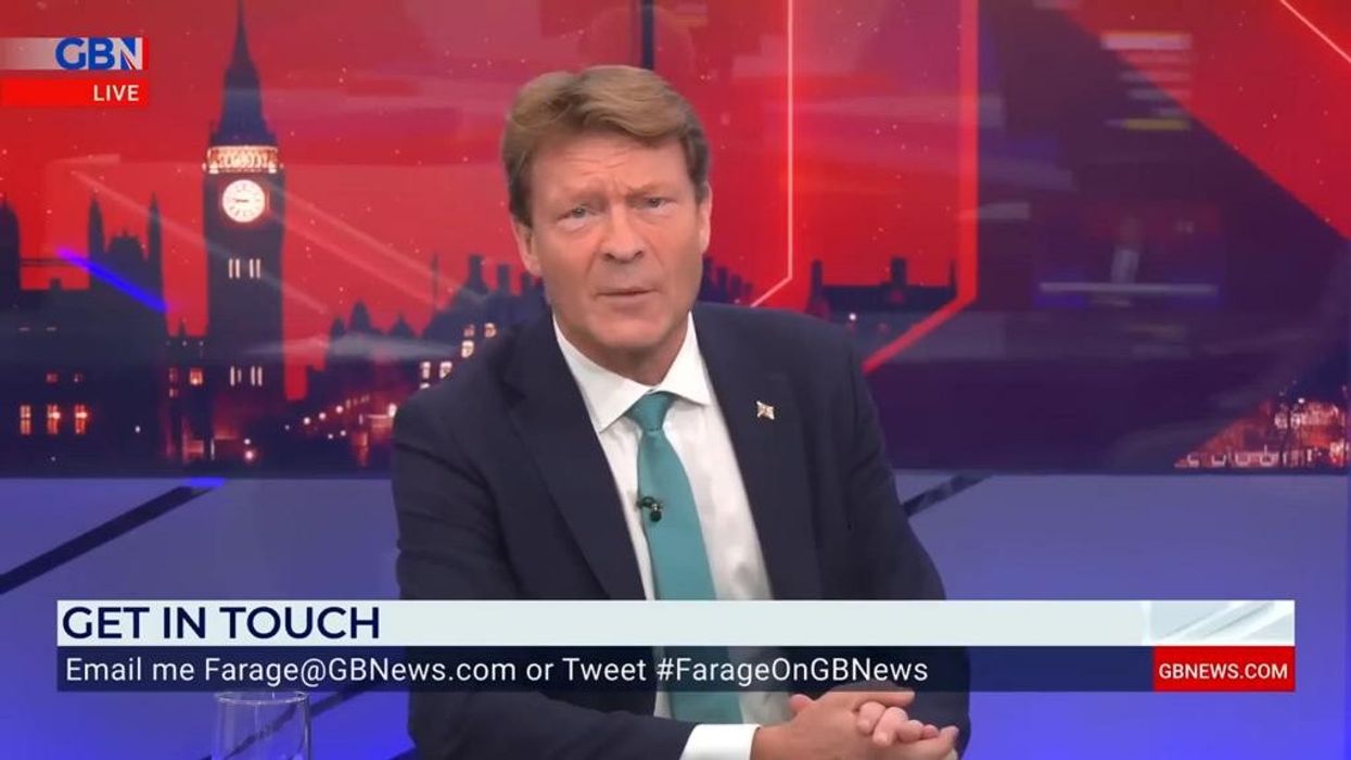 'Everyone wants a better life!' Richard Tice clashes with migrant lawyer on convention