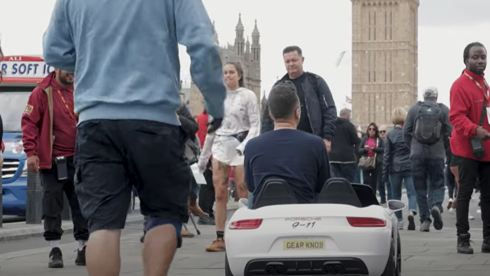 Rickard driving through London