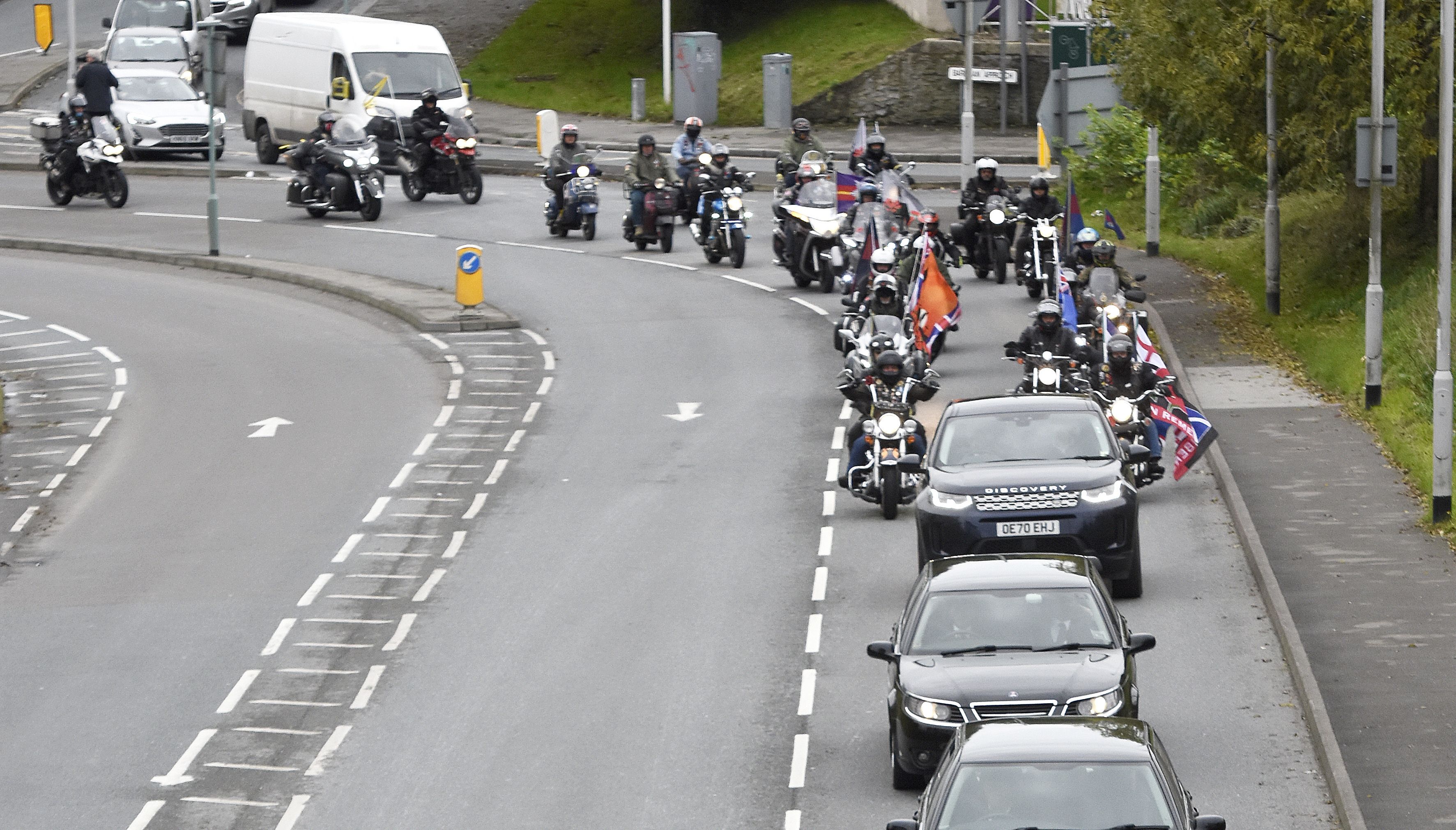 Riders from Rolling Thunder UK join the cortege towards St Andrew's Church in Plymouth for the funeral of Dennis Hutchings.