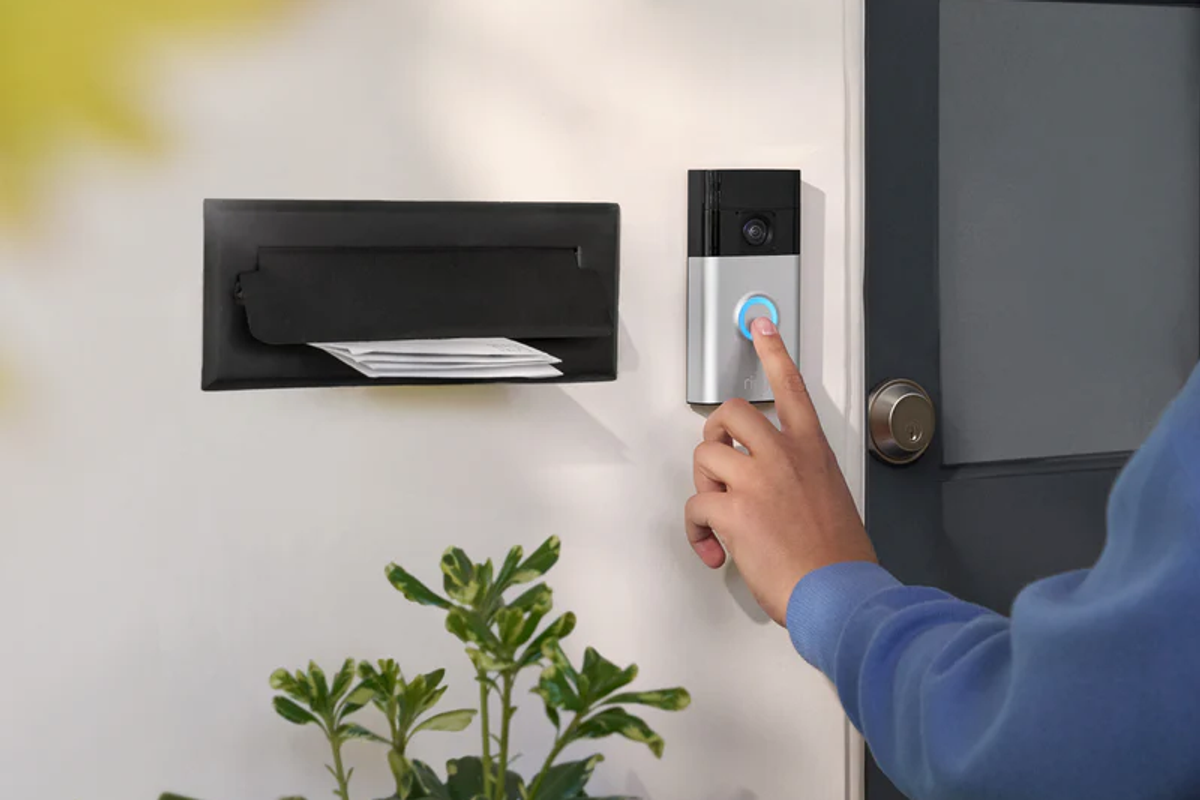 Ring video doorbell mounted next to front door