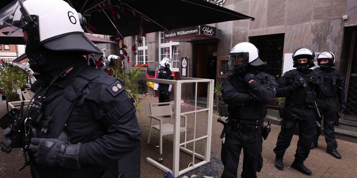 NextImg:Fans clash before England vs Serbia Euro 2024 game as German riot police 'arrest several'