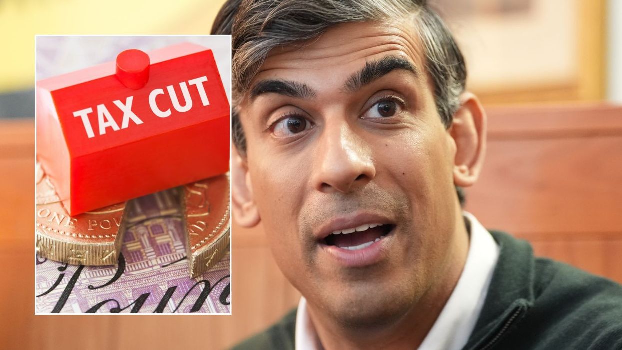 Rishi Sunak and tax cut sign