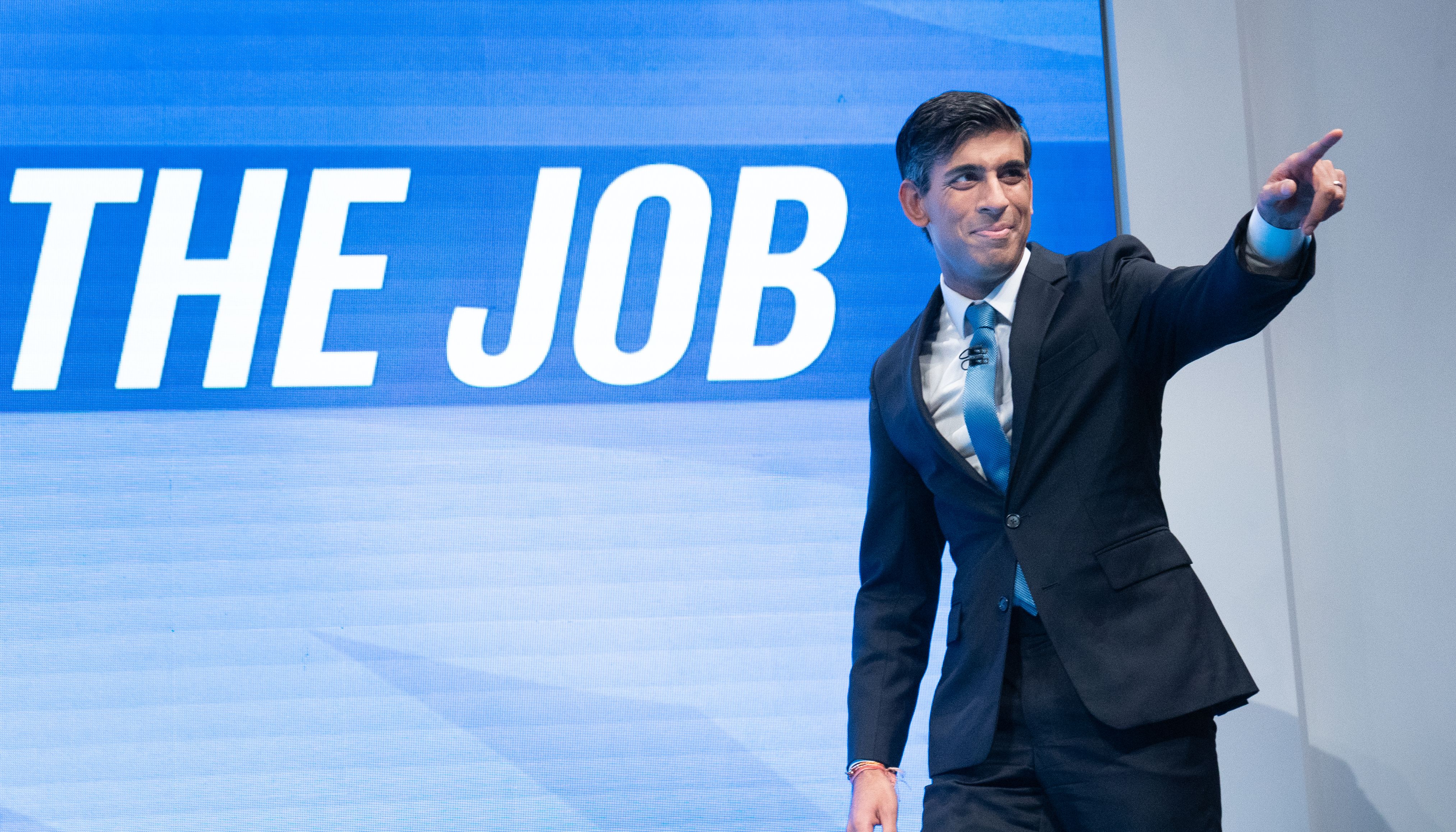 Rishi Sunak arriving on stage to deliver his keynote speech to the Conservative Party Conference in Manchester.