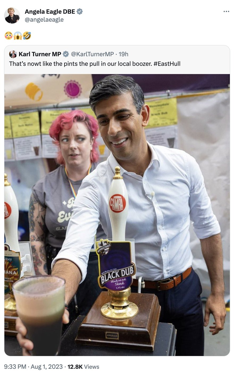 Rishi Sunak is seen holding a fake pint of Guinness