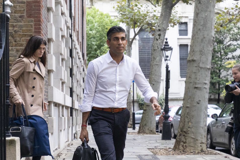 Rishi Sunak leaves his campaign office in London, as he has formally entered the Tory leadership contest following the resignation of Liz Truss as Prime Minister.