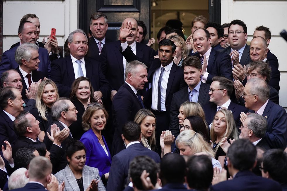 Rishi Sunak poses outside Conservative party HQ in Westminster, London, after it was announced he will become the new leader of the Conservative party after rival Penny Mordaunt dropped out. Picture date: Monday October 24, 2022.