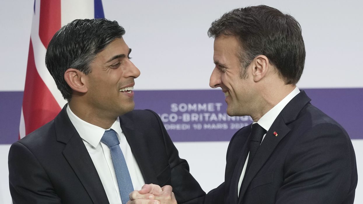 Rishi Sunak shaking hands with Emmanuel Macron