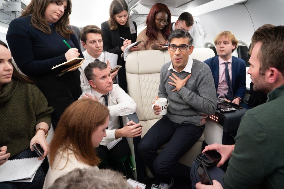 Rishi Sunak speaks to reporters