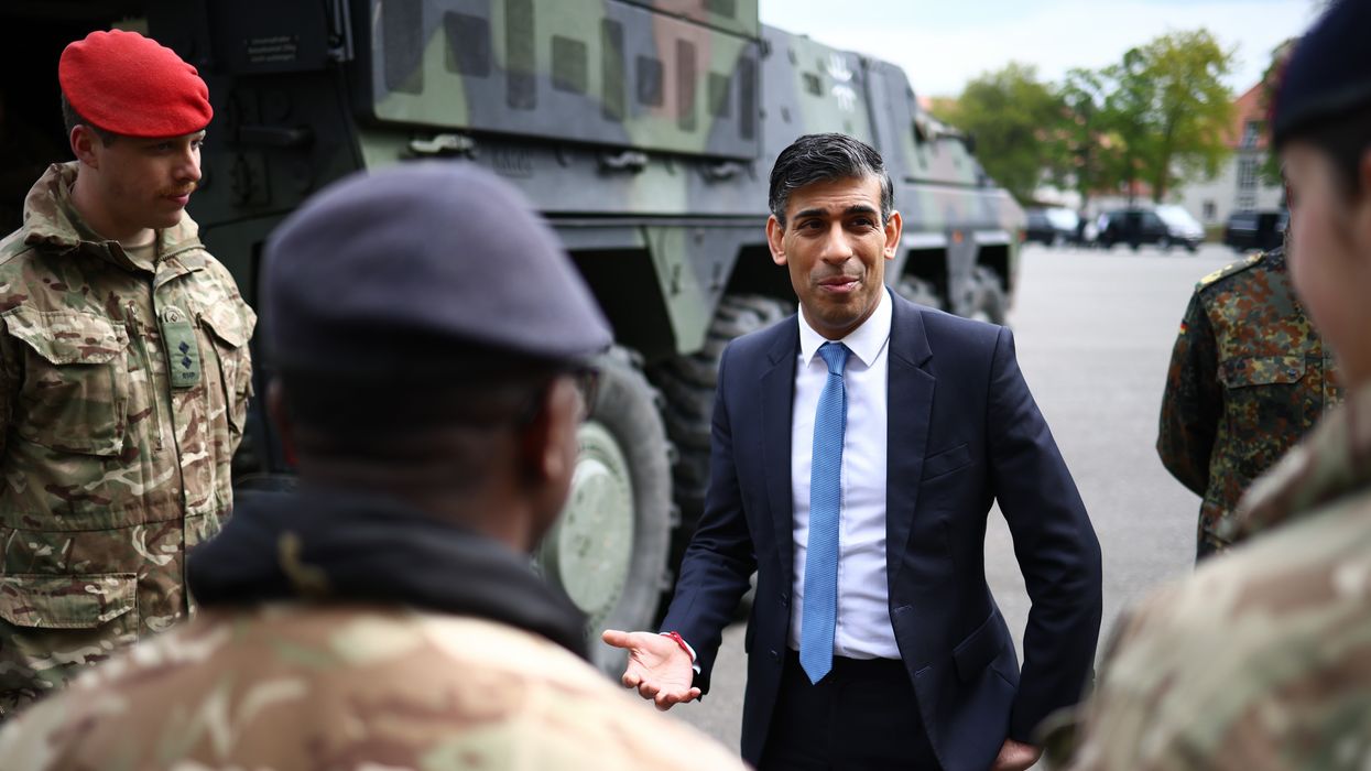 Rishi Sunak speaks with soldiers