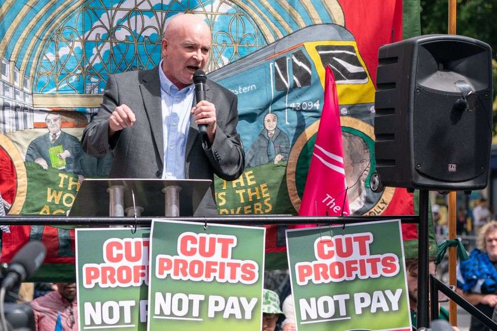 RMT general secretary Mick Lynch speaks at a rally outside Kings Cross station, London