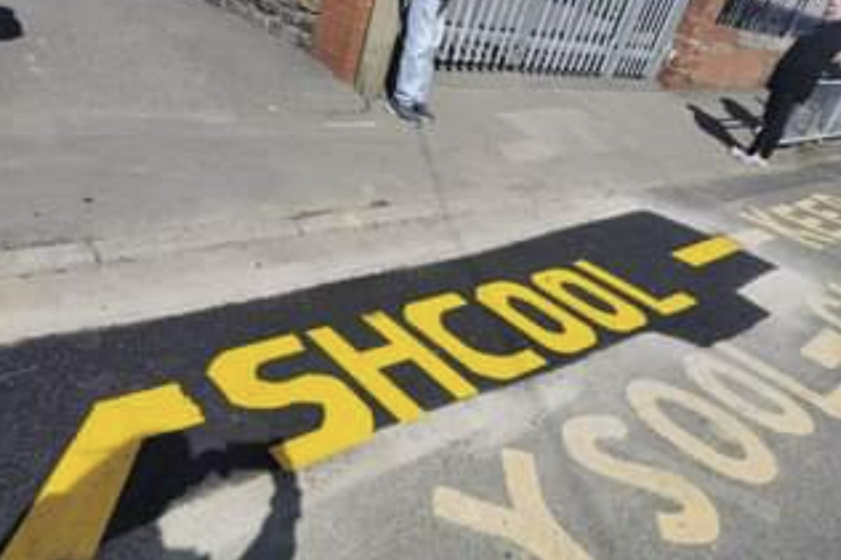 Road workers make humiliating error after mis-spelling 'school' in English and Welsh outside Swansea primary school