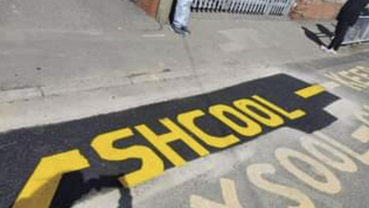 Road workers make humiliating error after mis-spelling 'school' in English and Welsh outside Swansea primary school