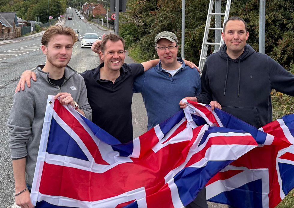 Robert Jenrick and volunteers in Newark before raising Union Flags